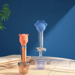 Baby-Medizinspender - Fütterungswerkzeug mit Cartoon-Bär