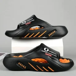 Bequeme orangefarbene Strandpantoffeln mit massierendem Fußbett für ganztägige Entspannung