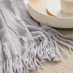 Geometrische Strickdecke - Gemütliche Wohndekoration