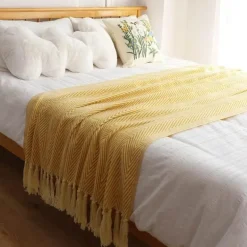 Geometrische Strickdecke – weiches, gemütliches Dekor