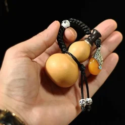 Glücksbringer-Schlüsselanhänger - Tragbare Amulettflasche