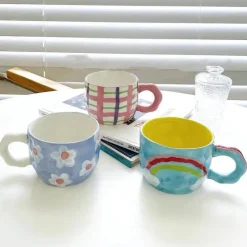 Handbemalte Regenbogenblumentasse - Einzigartige Kaffeetasse aus Keramik