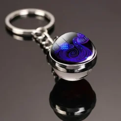 Im Dunkeln leuchtender kosmischer Schlüsselanhänger – leuchtendes, buntes Accessoire