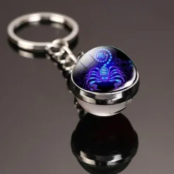 Im Dunkeln leuchtender kosmischer Schlüsselanhänger – leuchtendes, buntes Accessoire