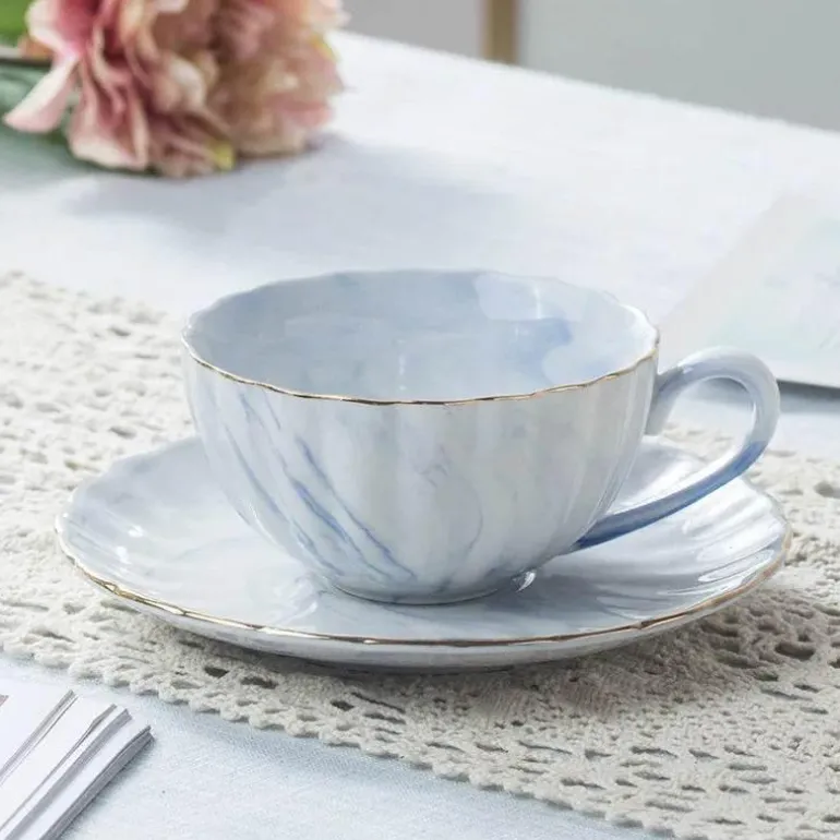 Kaffeetasse und Untertasse aus Porzellan mit Marmorstruktur – elegantes Nachmittagstee-Set