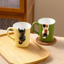 Keramiktasse mit Katzenmotiv – süße Kaffeetasse mit Klettertier