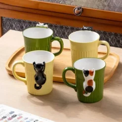 Keramiktasse mit Katzenmotiv – süße Kaffeetasse mit Klettertier