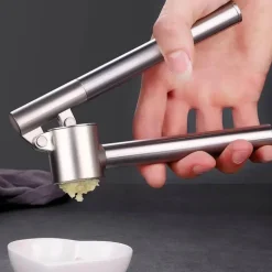 Knoblauchpresse aus Edelstahl – Küchenzerkleinerer, Stampfer, Gerät