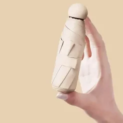 Kompakter Mini-Regenschirm für tragbaren Regen- und Sonnenschutz