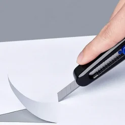 Kreative 2-in-1-Schere mit Safe Cut-Messer