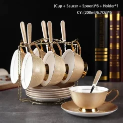 Luxuriöses Teeservice aus Knochenporzellan mit Goldbesatz, Teekanne, Kaffeetassen und Milchkännchen