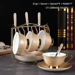 Luxuriöses Teeservice aus Knochenporzellan mit Goldbesatz, Teekanne, Kaffeetassen und Milchkännchen