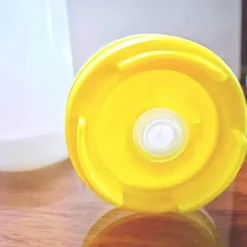 Quetschflasche mit Doppelkopf - Ketchup- und Dressing-Spender