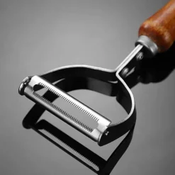 Schäler und Reibe aus Edelstahl – Multifunktionswerkzeug für müheloses Zubereiten von Obst und Gemüse