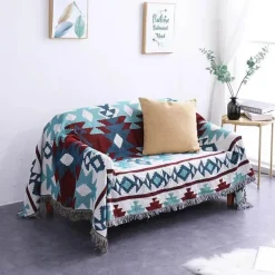 Strickdecke mit Blumen und Vögeln – Moderne Winterdecke