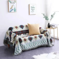 Strickdecke mit Blumen und Vögeln – Moderne Winterdecke