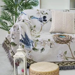 Strickdecke mit Blumen und Vögeln – Moderne Winterdecke