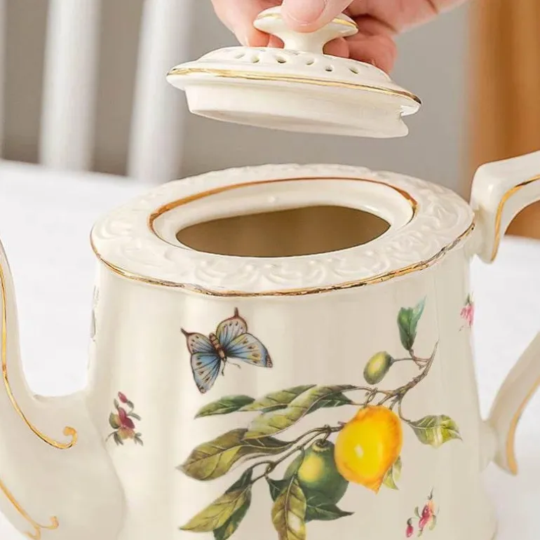 Tee- und Kaffeeservice aus Keramik – Zitronenteekanne mit goldenem Rand und Untertasse