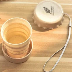 Umweltfreundlicher tragbarer faltbarer To-go-Becher aus Weizenplastik