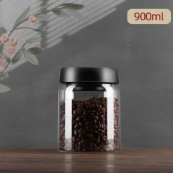 Vakuumversiegelter Kaffeebohnenbehälter aus Glas zur Frischhaltung in der Küche zu Hause