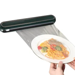 Wandmontierter Plastikfolienspender Automatischer Küchenorganizer