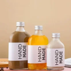 Wiederverwendbare Getränkeflaschen aus klarem Glas – perfekt zum Entsaften von Smoothies, Kombucha, Tee, Milch und Wein